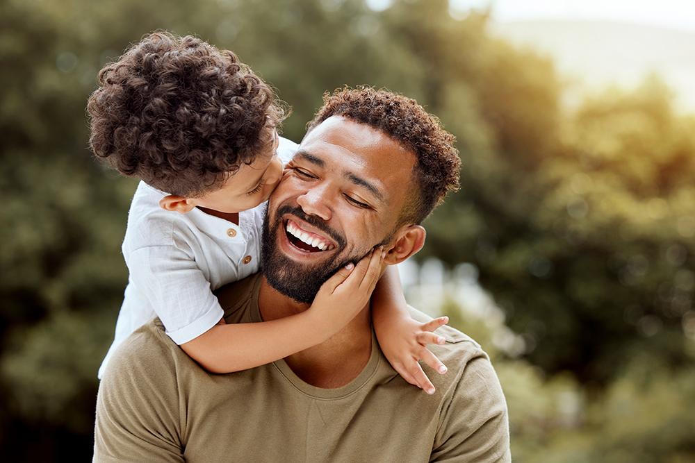 Father,,Bonding,Kiss,And,Boy,Child,Hug,Happy,In,Nature Turnberry Synergy Cover